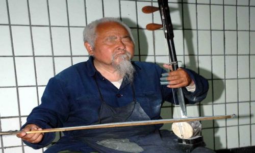 Zdjecie CHINY / brak / pekin / uliczny grajek