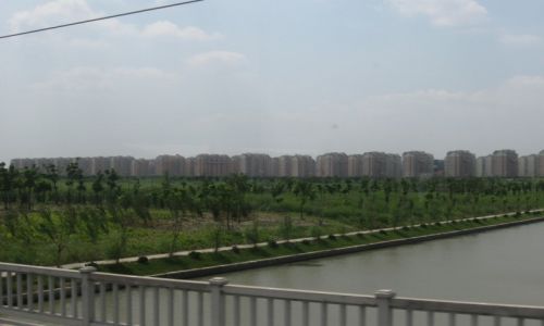 Zdjecie CHINY / Shanghai / Szanghaj / Osiedle mieszkaniowe w Chinach. Jak wida due.