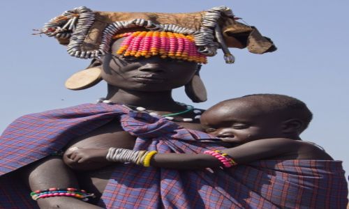 Zdjcie ETIOPIA / Dolina Omo / wioska Mursi / Moda mama ju bez rozcitej wargi na tradycyjny krek