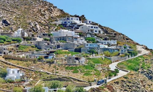 Zdjecie GRECJA / Cyklady / Mikonos / Zamieszkana skała na Mikonos