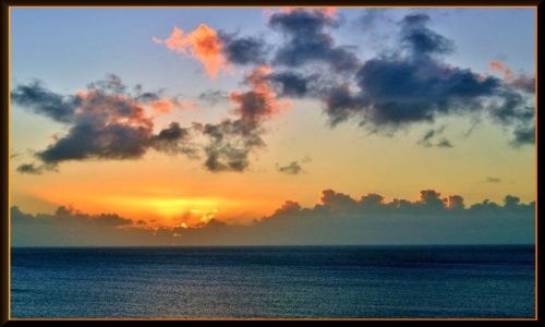 Zdjcie HISZPANIA / Gran Canaria / Playa del Ingles / Chmury socem malowane