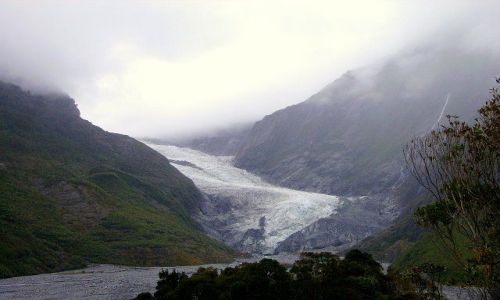 Zdjcie NOWA ZELANDIA / Wyspa Poudniowa / Westland / Franz Josef Glazier wyaniajcy si z porannej mgy