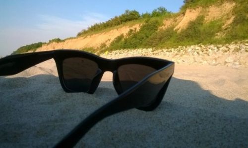 Zdjęcie POLSKA / zachodnio-pomorskie / Rewal / plaża, słońce, okularki