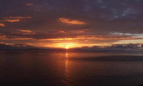 Zdjecie SZKOCJA / Hebrydy Wewnetrzne / Wyspa Skye / Zachod slonca na Hebrydami Zwenetrznymi