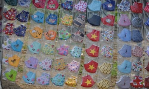 Zdjęcie WIETNAM / Delta Mekongu / Droga do My Tho / Maseczki