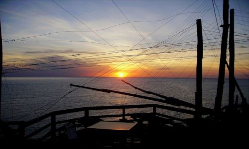 Zdjecie WOCHY / Pwysep Gargano / Peschici / zachd soca ogldany z tratorri w starm trabucco